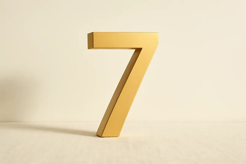 Large golden seven symbol on cream background with soft shadow